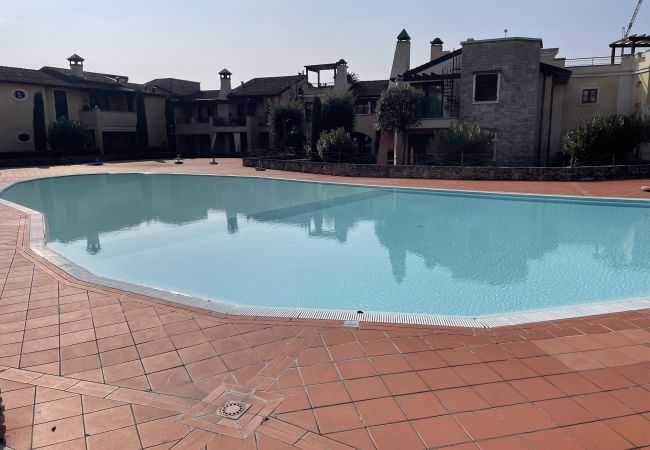 Ferienwohnung in Manerba del Garda - La Rocca Di Manerba relaxing pool  By Bookinggarda
