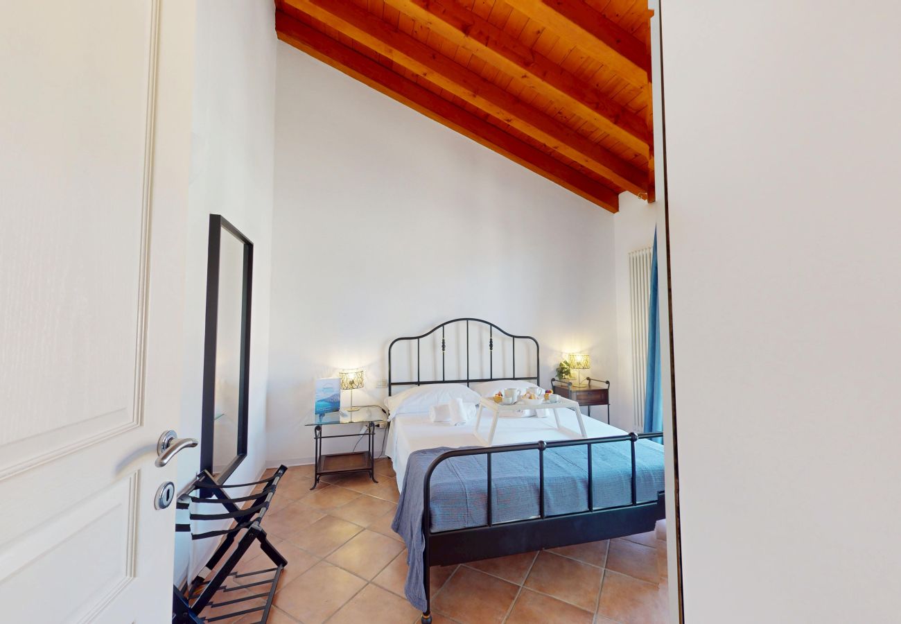 Ferienwohnung in Manerba del Garda - La Rocca Di Manerba relaxing pool  By Bookinggarda