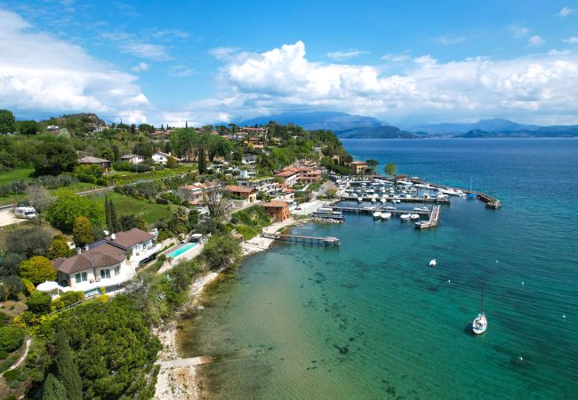 Villa in Manerba del Garda - Villa Flora fronte spiaggia By Bookinggardalake Villa in Manerba del Garda - Villa Flora fronte spiaggia By Bookinggardalake
