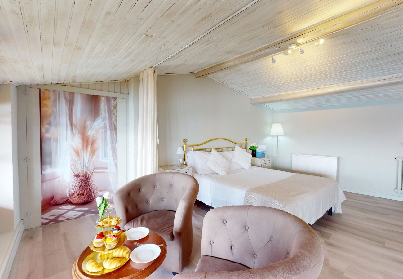 Apartment in Salò - ATTICO AGATA magic lake view By Bookinggardala