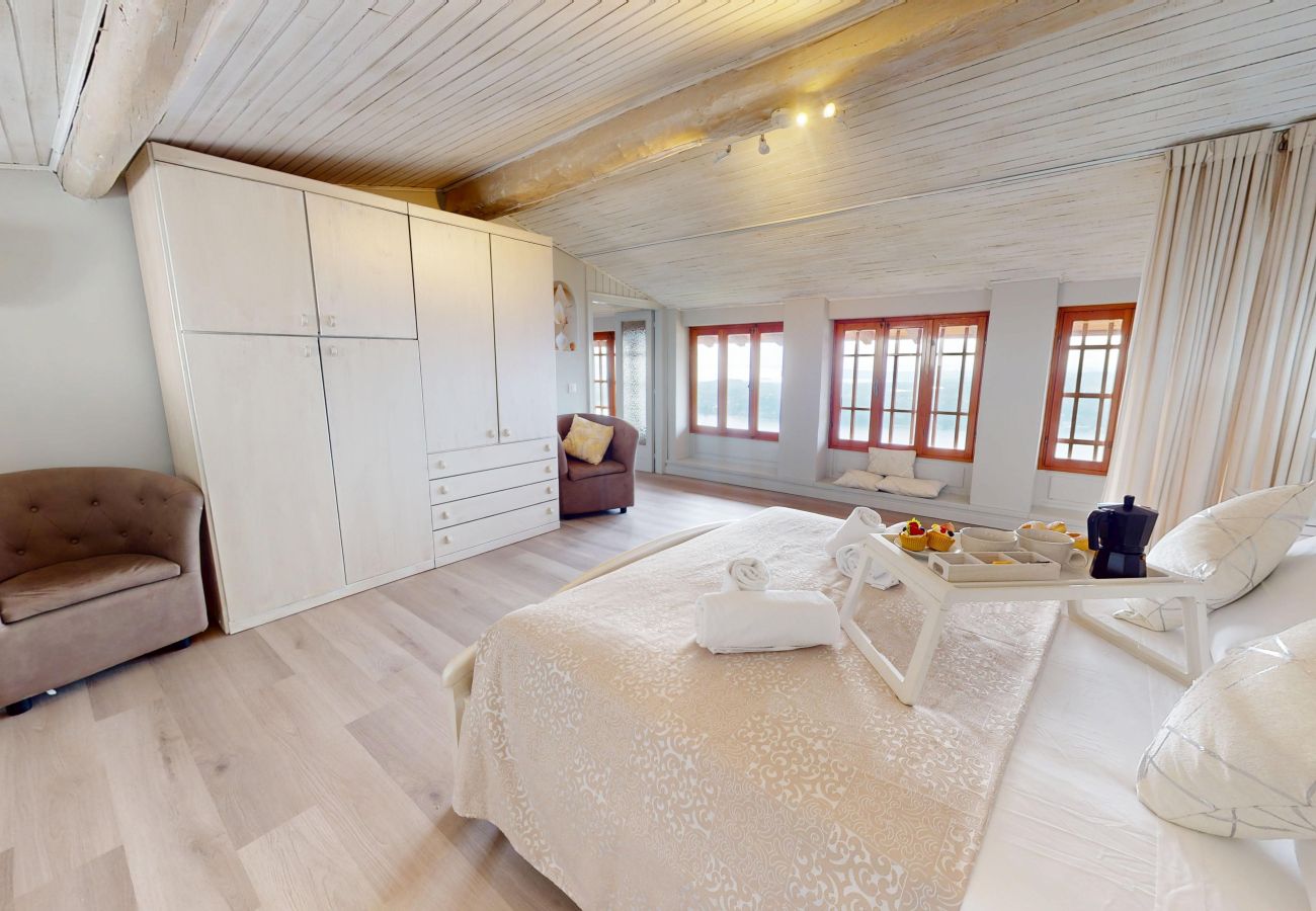 Apartment in Salò - ATTICO AGATA magic lake view By Bookinggardala