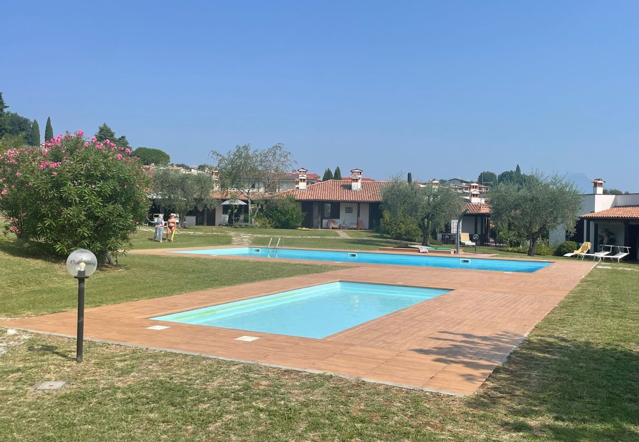 Chalet in Soiano del Lago - Harmonia Cottage by Bookinggardalake