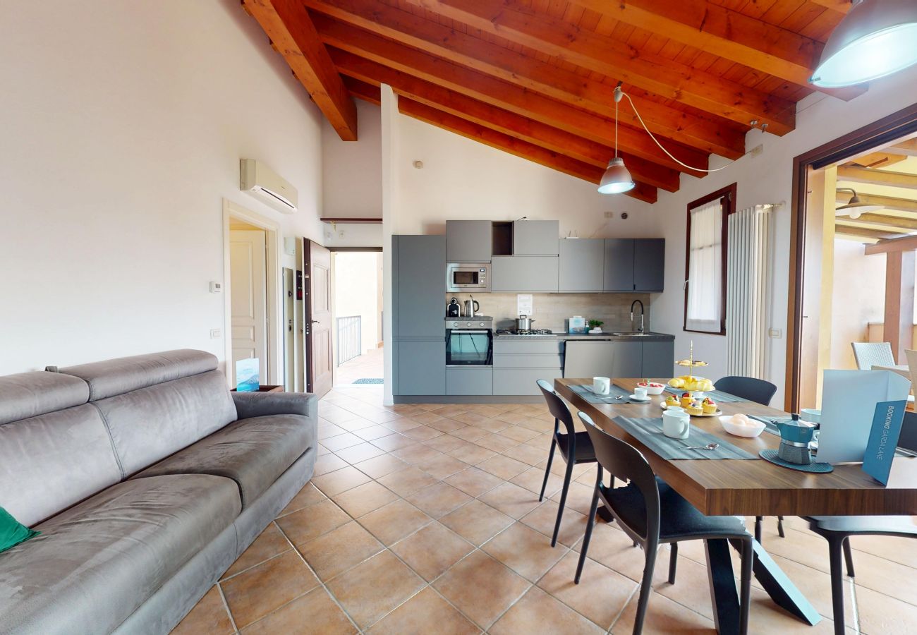 Apartment in Manerba del Garda - La Rocca Di Manerba relaxing pool  By Bookinggarda