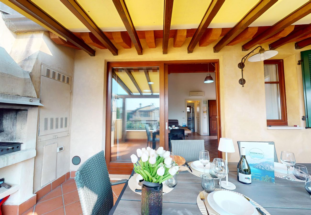 Apartment in Manerba del Garda - La Rocca Di Manerba relaxing pool  By Bookinggarda