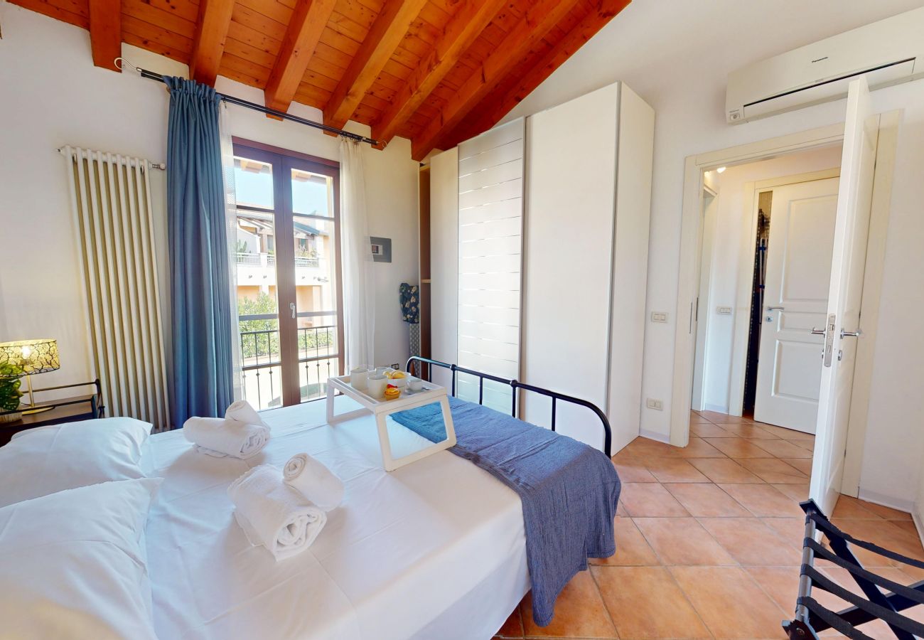 Apartment in Manerba del Garda - La Rocca Di Manerba relaxing pool  By Bookinggarda