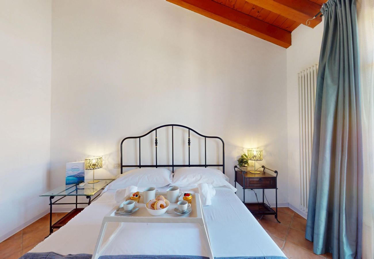 Apartment in Manerba del Garda - La Rocca Di Manerba relaxing pool  By Bookinggarda